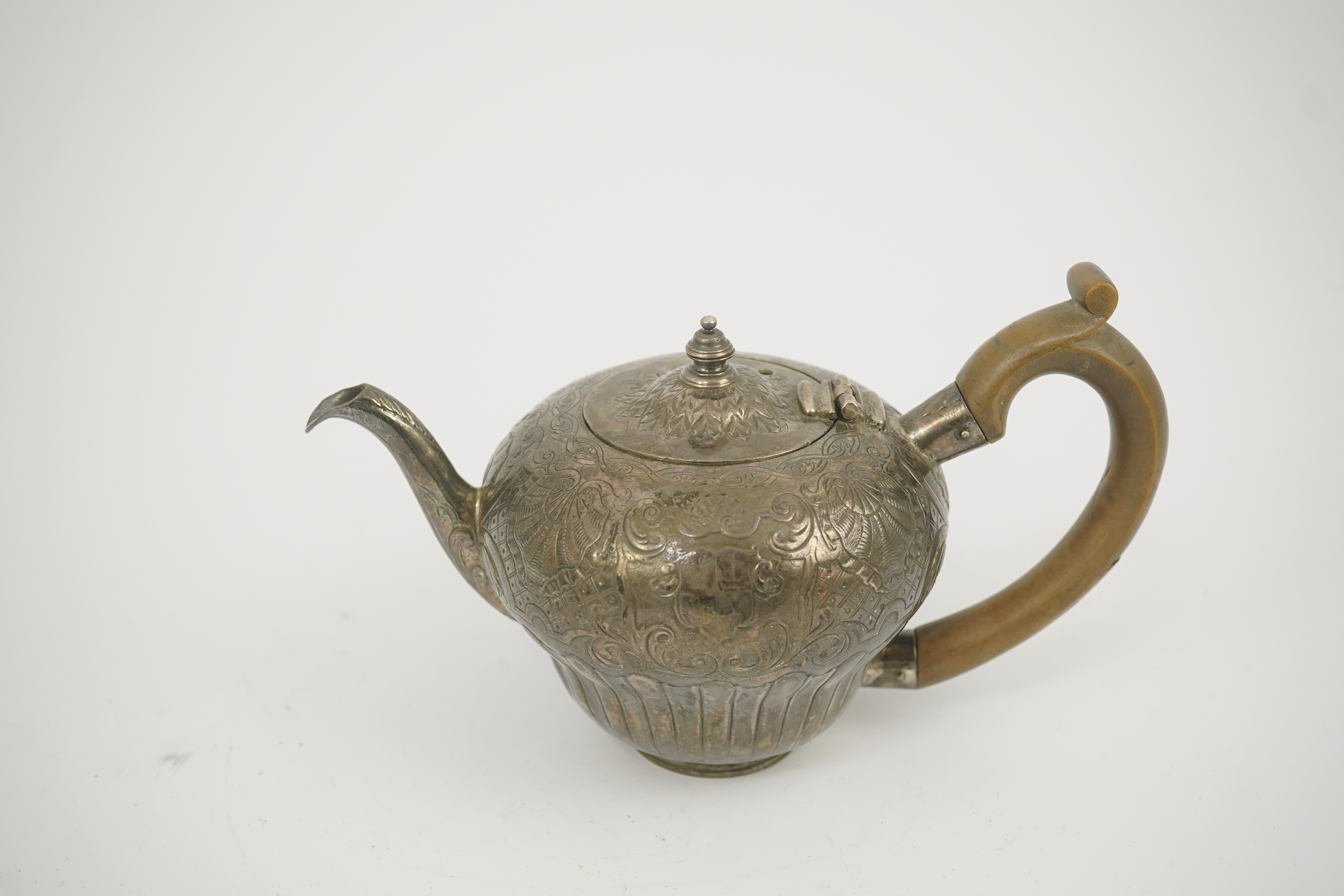 An 18th century Irish silver inverted pyriform bachelor's teapot, maker E.R